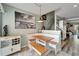 Built-in dining nook with white bench seating at 17960 Gulf Blvd # 123, Redington Shores, FL 33708