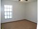 Bright bedroom featuring carpet flooring and a ceiling fan at 3205 Pleasant Lake Dr, Tampa, FL 33618