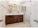 Bathroom with a double vanity and a walk-in shower at 3951 Claybrook Dr, Wesley Chapel, FL 33544