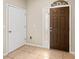 Inviting entryway with tiled flooring, featuring both interior and exterior doors at 3951 Claybrook Dr, Wesley Chapel, FL 33544