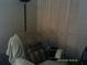 Bedroom with chair and built-in closet at 4036 Angel Oak Ct # 101, Tampa, FL 33613