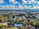 Wide aerial view showing house, neighborhood, and city skyline at 415 21St N St, St Petersburg, FL 33713