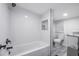 Clean bathroom with a shower/tub combo, toilet and modern vanity at 415 21St N St, St Petersburg, FL 33713
