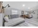 Bedroom with two twin daybeds, gray wood-look flooring and large windows at 415 21St N St, St Petersburg, FL 33713