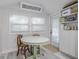 Small round table and chairs in a bright kitchen nook at 415 21St N St, St Petersburg, FL 33713
