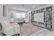 Living room with sectional sofa, built-in shelving and view into dining area at 415 21St N St, St Petersburg, FL 33713