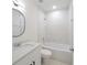 Modern bathroom with a bathtub, toilet and vanity at 4226 Elwood Rd, Spring Hill, FL 34609