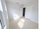 Well-lit bedroom with two closets and a window at 4226 Elwood Rd, Spring Hill, FL 34609