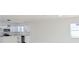 White kitchen with stainless steel appliances and island at 4226 Elwood Rd, Spring Hill, FL 34609