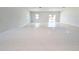 View of kitchen with white cabinets and quartz countertops at 4226 Elwood Rd, Spring Hill, FL 34609