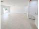 Bright and spacious living room with tile floors and sliding glass doors at 4226 Elwood Rd, Spring Hill, FL 34609