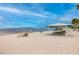 Scenic beach access with picnic tables and gazebos at 4939 Floramar Ter # 501, New Port Richey, FL 34652