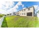 Large backyard with green grass and white fence at 529 Vista Ridge Dr, Ruskin, FL 33570