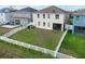 Spacious backyard with a white fence and grassy lawn at 529 Vista Ridge Dr, Ruskin, FL 33570