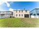 House backyard with green lawn and white fence at 529 Vista Ridge Dr, Ruskin, FL 33570