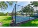 Enclosed basketball court with chain link fence at 529 Vista Ridge Dr, Ruskin, FL 33570