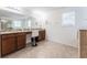 Elegant bathroom with a large vanity and soaking tub at 529 Vista Ridge Dr, Ruskin, FL 33570