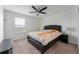 Bright bedroom with a queen-size bed and ceiling fan at 529 Vista Ridge Dr, Ruskin, FL 33570