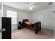 Small bedroom with a twin bed and ceiling fan at 529 Vista Ridge Dr, Ruskin, FL 33570