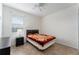 Cozy bedroom with double bed, nightstand and window at 529 Vista Ridge Dr, Ruskin, FL 33570