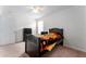 Simple bedroom with a twin bed and ceiling fan at 529 Vista Ridge Dr, Ruskin, FL 33570