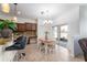Bright dining area with table and chairs, adjacent to kitchen at 529 Vista Ridge Dr, Ruskin, FL 33570