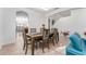 Dining room with a large wooden table and six chairs at 529 Vista Ridge Dr, Ruskin, FL 33570