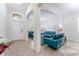 Entryway with view of living room and teal couches at 529 Vista Ridge Dr, Ruskin, FL 33570