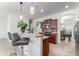 Kitchen boasts breakfast bar, granite counters, and dark wood cabinets at 529 Vista Ridge Dr, Ruskin, FL 33570