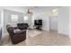 Relaxing living room with sectional sofa and ceiling fan at 529 Vista Ridge Dr, Ruskin, FL 33570