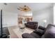 Living room with sectional sofa, coffee table and view of kitchen at 529 Vista Ridge Dr, Ruskin, FL 33570
