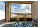 Cozy screened patio with small table and chairs at 529 Vista Ridge Dr, Ruskin, FL 33570