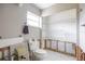 Unfinished bathroom with new toilet and shelving; renovation in progress at 6951 S Shore S Dr, South Pasadena, FL 33707