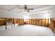 Renovation in progress, shows a room with exposed wall studs and flooring at 6951 S Shore S Dr, South Pasadena, FL 33707
