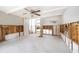 Interior view of a home undergoing renovations, showing exposed framing and flooring at 6951 S Shore S Dr, South Pasadena, FL 33707