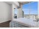 Bedroom with access to balcony and city view at 777 N Ashley Dr # 2703, Tampa, FL 33602