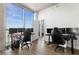 Modern office with city views and two gaming setups at 777 N Ashley Dr # 2703, Tampa, FL 33602