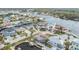 Wide aerial showcasing waterfront homes, properties, and boat docks at 8009 Brighton Dr, Port Richey, FL 34668