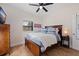 Bedroom with wooden bed frame and wood floors at 826 53Rd N Ter, St Petersburg, FL 33703