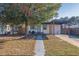 House exterior with teal door and covered walkway at 826 53Rd N Ter, St Petersburg, FL 33703