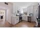 Updated kitchen with white shaker cabinets and stainless steel appliances at 826 53Rd N Ter, St Petersburg, FL 33703