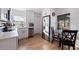 Modern white kitchen with stainless steel appliances and herringbone backsplash at 826 53Rd N Ter, St Petersburg, FL 33703
