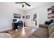 Home office with desk, couch, and backyard access at 826 53Rd N Ter, St Petersburg, FL 33703