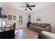 Home office features a brown couch and wooden desk at 826 53Rd N Ter, St Petersburg, FL 33703