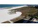 Aerial view of beach, boardwalk, and surrounding landscape at 1270 Gulf Blvd # 1102, Clearwater Beach, FL 33767