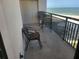 Private balcony with ocean view, comfortable seating for relaxing at 1270 Gulf Blvd # 1102, Clearwater Beach, FL 33767