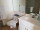 Bathroom featuring a vanity, toilet, and shower/tub at 1270 Gulf Blvd # 1102, Clearwater Beach, FL 33767