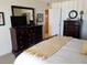 Spacious bedroom with king-size bed and ample dresser space at 1270 Gulf Blvd # 1102, Clearwater Beach, FL 33767