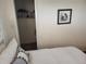 Bedroom with closet and calming coastal decor at 1270 Gulf Blvd # 1102, Clearwater Beach, FL 33767