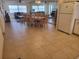 Dining area with a table and chairs, view of living room at 1270 Gulf Blvd # 1102, Clearwater Beach, FL 33767